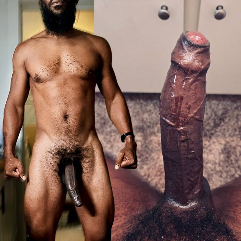 Nude black man presenting huge uncut dick